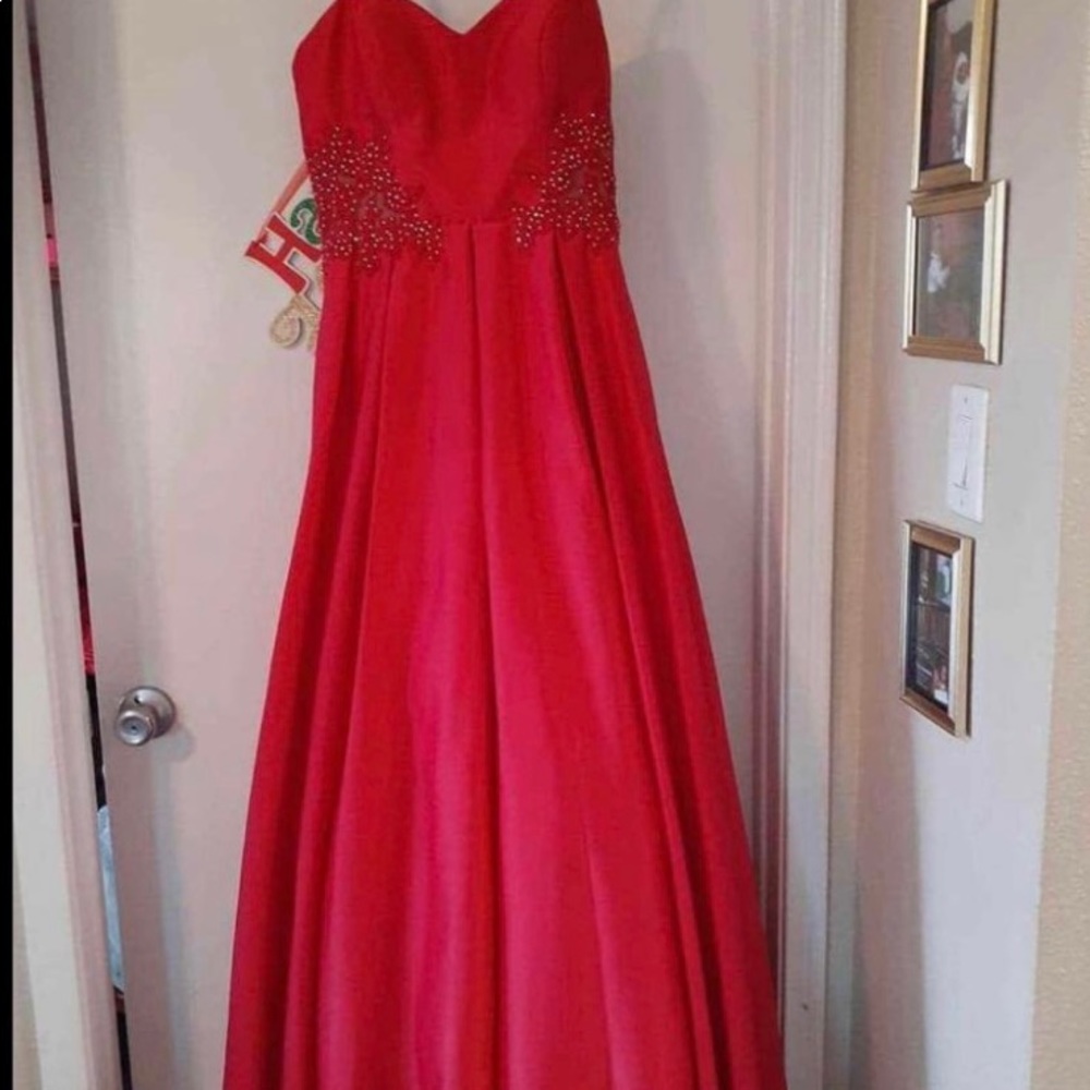 Beautiful Blondie Nites Dress never worn tags attached.